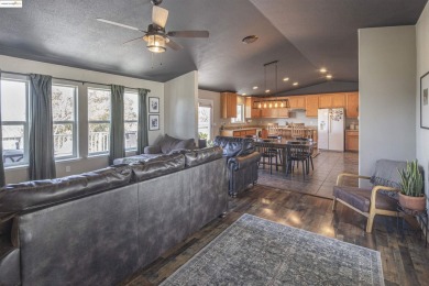 Charming 3-Bed, 2-Bath Home with Stunning Views  Lake Tulloch on The Club at Copper Valley Golf Course in California - for sale on GolfHomes.com, golf home, golf lot