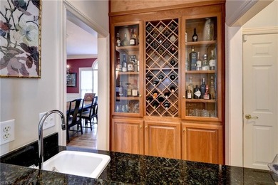 Located in sought-after Governor's Land, this all-brick custom on Two Rivers Country Club in Virginia - for sale on GolfHomes.com, golf home, golf lot