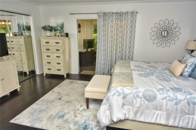 Updated dark floors add drama to the decor in this one bedroom 1 on Pine Lakes Golf Club in Florida - for sale on GolfHomes.com, golf home, golf lot