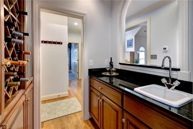 Located in sought-after Governor's Land, this all-brick custom on Two Rivers Country Club in Virginia - for sale on GolfHomes.com, golf home, golf lot