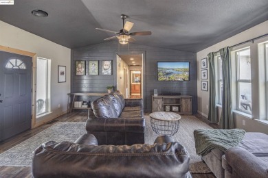 Charming 3-Bed, 2-Bath Home with Stunning Views  Lake Tulloch on The Club at Copper Valley Golf Course in California - for sale on GolfHomes.com, golf home, golf lot