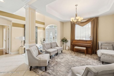 Welcome to this beautiful home located in the prestigious, gated on Country Club of Orange Park in Florida - for sale on GolfHomes.com, golf home, golf lot
