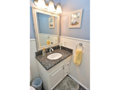 Updated dark floors add drama to the decor in this one bedroom 1 on Pine Lakes Golf Club in Florida - for sale on GolfHomes.com, golf home, golf lot