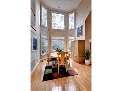 Located in sought-after Governor's Land, this all-brick custom on Two Rivers Country Club in Virginia - for sale on GolfHomes.com, golf home, golf lot