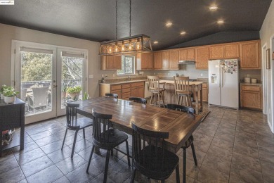 Charming 3-Bed, 2-Bath Home with Stunning Views  Lake Tulloch on The Club at Copper Valley Golf Course in California - for sale on GolfHomes.com, golf home, golf lot