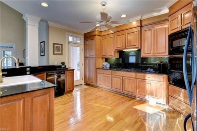 Located in sought-after Governor's Land, this all-brick custom on Two Rivers Country Club in Virginia - for sale on GolfHomes.com, golf home, golf lot