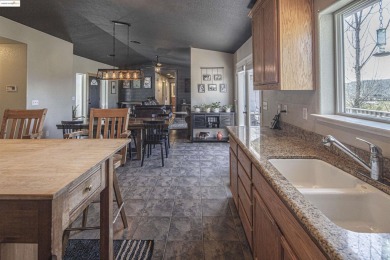 Charming 3-Bed, 2-Bath Home with Stunning Views  Lake Tulloch on The Club at Copper Valley Golf Course in California - for sale on GolfHomes.com, golf home, golf lot
