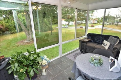 Updated dark floors add drama to the decor in this one bedroom 1 on Pine Lakes Golf Club in Florida - for sale on GolfHomes.com, golf home, golf lot