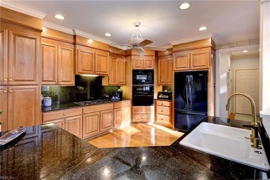 Located in sought-after Governor's Land, this all-brick custom on Two Rivers Country Club in Virginia - for sale on GolfHomes.com, golf home, golf lot