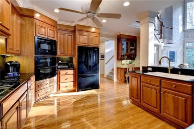 Located in sought-after Governor's Land, this all-brick custom on Two Rivers Country Club in Virginia - for sale on GolfHomes.com, golf home, golf lot