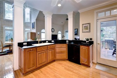 Located in sought-after Governor's Land, this all-brick custom on Two Rivers Country Club in Virginia - for sale on GolfHomes.com, golf home, golf lot