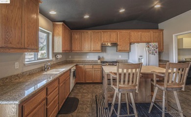Charming 3-Bed, 2-Bath Home with Stunning Views  Lake Tulloch on The Club at Copper Valley Golf Course in California - for sale on GolfHomes.com, golf home, golf lot