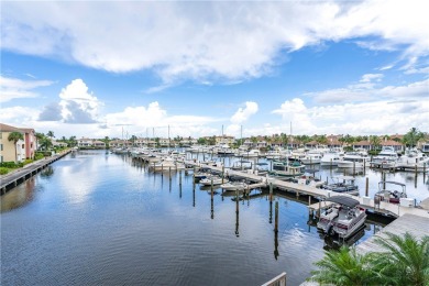 This spectacular Harborfront condo has been totally updated with on Grand Harbor Golf and Country Club in Florida - for sale on GolfHomes.com, golf home, golf lot