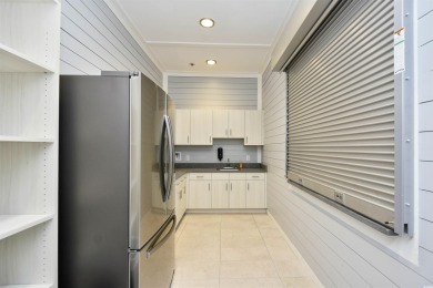 Welcome to your ideal top floor retreat of Arbor Trace in on Barefoot Resort and Golf Club  in South Carolina - for sale on GolfHomes.com, golf home, golf lot