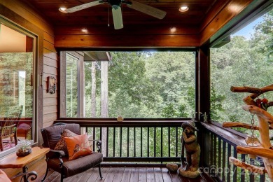 Nestled on 2.4 serene acres, this inviting retreat beckons you on Smoky Mountain Country Club in North Carolina - for sale on GolfHomes.com, golf home, golf lot