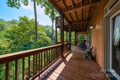 Nestled on 2.4 serene acres, this inviting retreat beckons you on Smoky Mountain Country Club in North Carolina - for sale on GolfHomes.com, golf home, golf lot