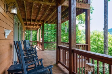 Nestled on 2.4 serene acres, this inviting retreat beckons you on Smoky Mountain Country Club in North Carolina - for sale on GolfHomes.com, golf home, golf lot