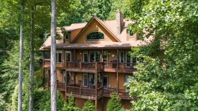 Nestled on 2.4 serene acres, this inviting retreat beckons you on Smoky Mountain Country Club in North Carolina - for sale on GolfHomes.com, golf home, golf lot