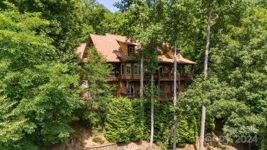 Nestled on 2.4 serene acres, this inviting retreat beckons you on Smoky Mountain Country Club in North Carolina - for sale on GolfHomes.com, golf home, golf lot