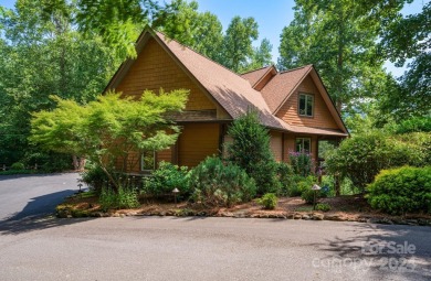 Nestled on 2.4 serene acres, this inviting retreat beckons you on Smoky Mountain Country Club in North Carolina - for sale on GolfHomes.com, golf home, golf lot