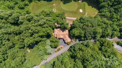 Nestled on 2.4 serene acres, this inviting retreat beckons you on Smoky Mountain Country Club in North Carolina - for sale on GolfHomes.com, golf home, golf lot