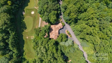 Nestled on 2.4 serene acres, this inviting retreat beckons you on Smoky Mountain Country Club in North Carolina - for sale on GolfHomes.com, golf home, golf lot