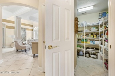 Welcome to this beautiful home located in the prestigious, gated on Country Club of Orange Park in Florida - for sale on GolfHomes.com, golf home, golf lot