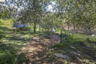 Charming 3-Bed, 2-Bath Home with Stunning Views  Lake Tulloch on The Club at Copper Valley Golf Course in California - for sale on GolfHomes.com, golf home, golf lot