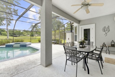 Welcome to this beautiful home located in the prestigious, gated on Country Club of Orange Park in Florida - for sale on GolfHomes.com, golf home, golf lot