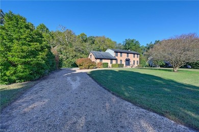 Welcome to this beautifully updated 5 bedroom, 3 bath home that on Cedar Point Country Club in Virginia - for sale on GolfHomes.com, golf home, golf lot