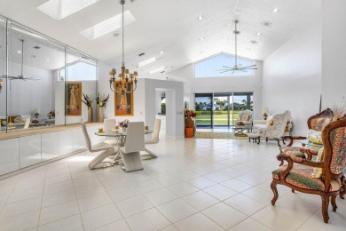 From the moment you walk in, you're greeted with volume ceilings on Indian Spring Golf and Country Club in Florida - for sale on GolfHomes.com, golf home, golf lot