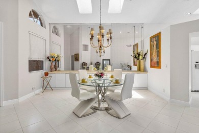 From the moment you walk in, you're greeted with volume ceilings on Indian Spring Golf and Country Club in Florida - for sale on GolfHomes.com, golf home, golf lot