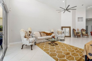 From the moment you walk in, you're greeted with volume ceilings on Indian Spring Golf and Country Club in Florida - for sale on GolfHomes.com, golf home, golf lot