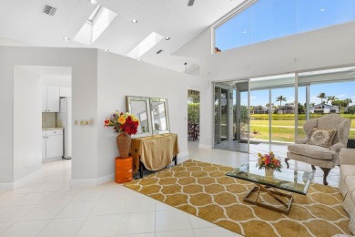 From the moment you walk in, you're greeted with volume ceilings on Indian Spring Golf and Country Club in Florida - for sale on GolfHomes.com, golf home, golf lot