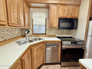 **Fully Furnished**Nestled on a large corner at the edge of on Augusta Ranch Golf Club in Arizona - for sale on GolfHomes.com, golf home, golf lot