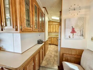 **Fully Furnished**Nestled on a large corner at the edge of on Augusta Ranch Golf Club in Arizona - for sale on GolfHomes.com, golf home, golf lot