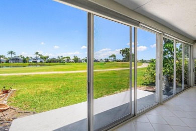 From the moment you walk in, you're greeted with volume ceilings on Indian Spring Golf and Country Club in Florida - for sale on GolfHomes.com, golf home, golf lot