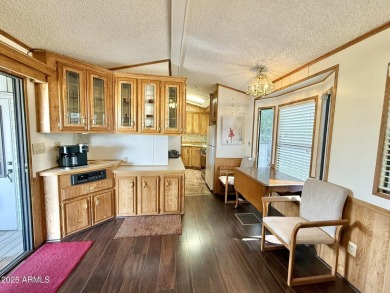 **Fully Furnished**Nestled on a large corner at the edge of on Augusta Ranch Golf Club in Arizona - for sale on GolfHomes.com, golf home, golf lot