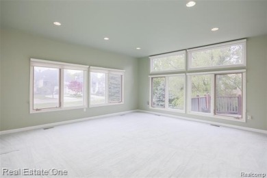 Magnificent, contemporary style Colonial 6 bedrooms (2 in Fin on Tam O Shanter Country Club in Michigan - for sale on GolfHomes.com, golf home, golf lot
