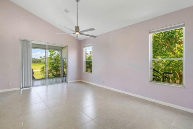 From the moment you walk in, you're greeted with volume ceilings on Indian Spring Golf and Country Club in Florida - for sale on GolfHomes.com, golf home, golf lot