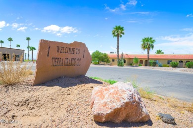 Welcome to this beautifully remodeled 2-bedroom end-unit on Tierra Grande Golf Club in Arizona - for sale on GolfHomes.com, golf home, golf lot