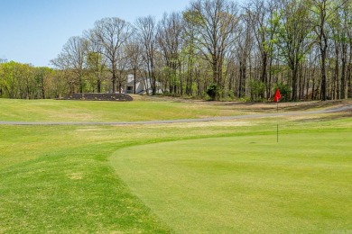 Enjoy resort-style living on the 11th green of Diamondhead Golf on Diamondhead Golf and Country Club in Arkansas - for sale on GolfHomes.com, golf home, golf lot