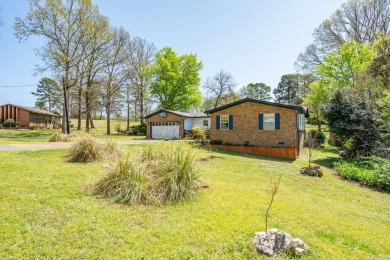 Enjoy resort-style living on the 11th green of Diamondhead Golf on Diamondhead Golf and Country Club in Arkansas - for sale on GolfHomes.com, golf home, golf lot