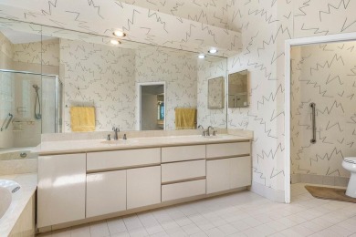 From the moment you walk in, you're greeted with volume ceilings on Indian Spring Golf and Country Club in Florida - for sale on GolfHomes.com, golf home, golf lot