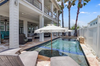 Here is your chance to own a CALEB custom contemporary beach on Palmilla Beach Golf Club in Texas - for sale on GolfHomes.com, golf home, golf lot