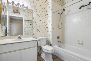 From the moment you walk in, you're greeted with volume ceilings on Indian Spring Golf and Country Club in Florida - for sale on GolfHomes.com, golf home, golf lot