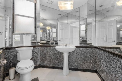 From the moment you walk in, you're greeted with volume ceilings on Indian Spring Golf and Country Club in Florida - for sale on GolfHomes.com, golf home, golf lot