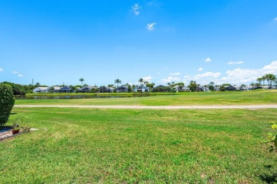 From the moment you walk in, you're greeted with volume ceilings on Indian Spring Golf and Country Club in Florida - for sale on GolfHomes.com, golf home, golf lot
