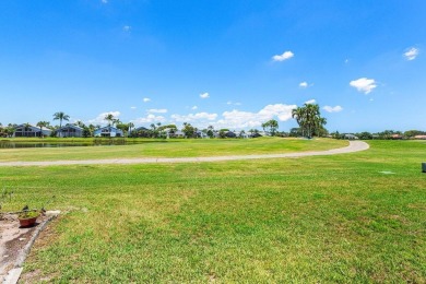 From the moment you walk in, you're greeted with volume ceilings on Indian Spring Golf and Country Club in Florida - for sale on GolfHomes.com, golf home, golf lot