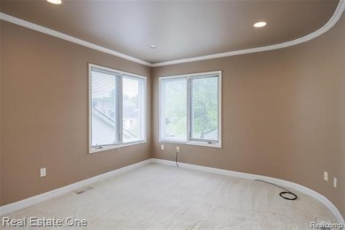 Magnificent, contemporary style Colonial 6 bedrooms (2 in Fin on Tam O Shanter Country Club in Michigan - for sale on GolfHomes.com, golf home, golf lot